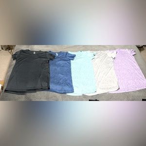 Set of 5 shirts. Worn only 1x each. 90% POLYESTER 10% SPANDEX